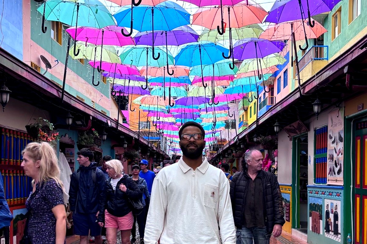 Looking up at colorful umbrellas